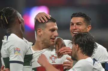 Diogo Dalot (centre) scored twice in Portugal's 4-0 win over Czech Republic