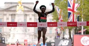 Joyciline Jepkosgei crosses the line to win the Women's elite race during the Virgin Money London Marathon. Picture date: Sunday October 3, 2021. (Photo by Yui Mok/PA Images via Getty Images).