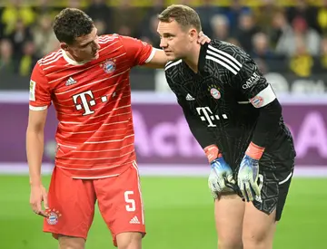 Benjamin Pavard (L) and Manuel Neuer during last month's draw at Borussia Dortmund