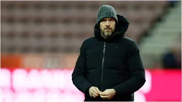 Erik ten Hag on the pitch before the Emirates FA Cup Third Round match between Wigan Athletic and Manchester United. Photo by Richard Sellers.