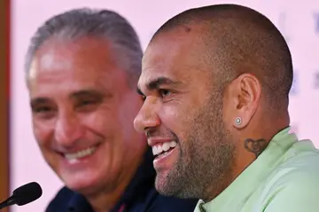Brazil coach Tite (L) together with Dani Alves at a press conference on Thursday