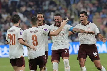 Mateo Kovacic celebrates with teammates after scoring against Urawa Reds