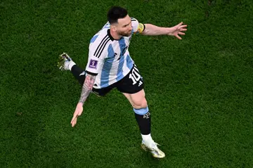 Argentina forward Lionel Messi celebrates scoring in the first half against Australia