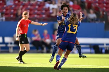 Japan's Kiko Seike celebrates with teammate Jun Endo after scoring a goal in her team's 3-0 victory over Canada in the SheBelieves Cup