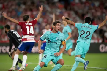 Barcelona midfielder Sergi Roberto celebrates after scoring the equaliser in a thrilling clash against Granada in La Liga