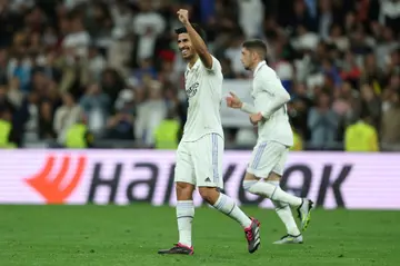 Real Madrid's Spanish forward Marco Asensio celebrates scoring his team's first goal against Celta Vigo