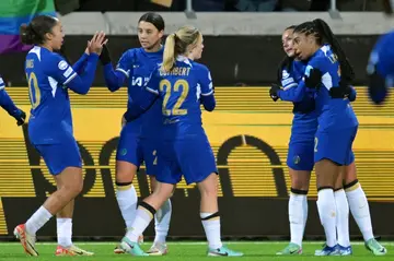 Samantha Kerr (2nd L) celebrates with teammates after putting Chelsea ahead against Hacken