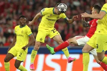 Midfielder Nicolo Barella heading in Inter's opener at Benfica in the first leg