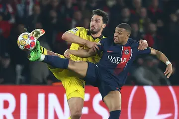 Borussia Dortmund defender Mats Hummels kept Paris Saint-Germain forward Kylian Mbappe at bay to book his return to the Champions League final