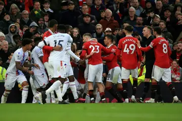 Players scuffle leading to a red card for Manchester United's Brazilian midfielder Casemiro