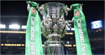The Carabao Cup is seen pitchside prior to the Carabao Cup Round of 16 match between Chelsea and Manchester United. Photo by Michael Regan.