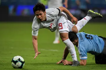 Celtic recruit - Tomoki Iwata (top) is the latest Japanese player to join the Scottish champions