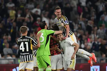 Jump for joy: Juventus players celebrate after winning the Italian Cup final
