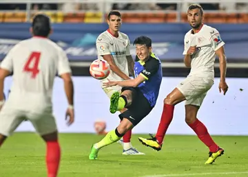 Tottenham Hotspur's Son Heung-min shoots against Sevilla in Suwon