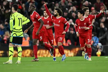 Liverpool's Mohamed Salah celebrates after scoring in the draw against Arsenal