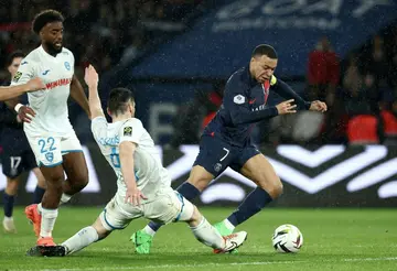 Kylian Mbappe (R) in action for Paris Saint-Germain against Le Havre on Saturday