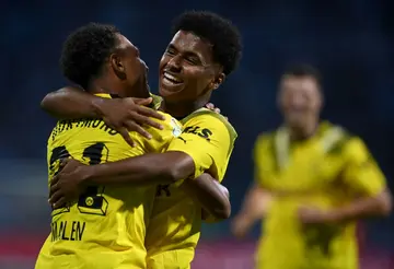 Karim Adeyemi celebrates with teammate Donyell Malen during Borussia Dortmund's German Cup win over 1860 Munich last week