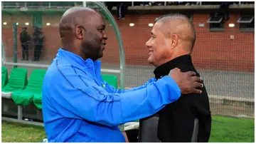 Cavin Johnson is pictured alongside Pitso Mosimane. Photo: @FARPostZA.