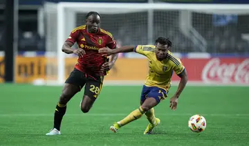 Emeka Eneli and Yeimar Gómez at Lumen Field in Seattle