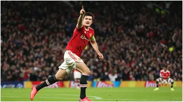 Harry Maguire celebrates after scoring during the UEFA Champions League Group F match between Manchester United and Atalanta at Old Trafford. Photo by Charlotte Tattersall.