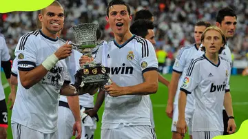 Real Madrid players celebrating their Super Cup victory in 2012