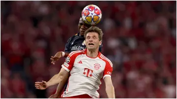 Aurelien Tchouameni, Thomas Muller, Real Madrid, Bayern Munich, UEFA Champions League, Allianz Arena, Munich, Germany.