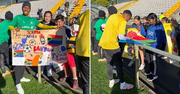 Banyana Banyana players with some of their young fans in New Zealand.