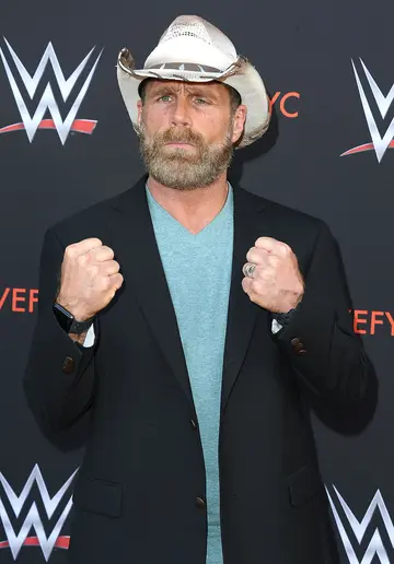 Why did Shawn Michaels leave WWE?