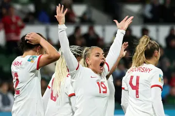 Canada's forward Adriana Leon celebrates scoring her team's second goal