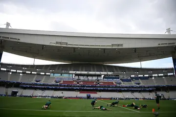 The match officials for Saturday's Champions League final warm up on the pitch of the Ataturk Olympic Stadium in Istanbul