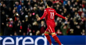 Mohamed Salah of Liverpool celebrates after scoring the opening goal during the Premier League match between Liverpool and Leeds United at Anfield on February 23, 2022 in Liverpool, England. (Photo by Andrew Powell/Liverpool FC via Getty Images)