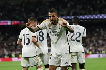 Real Madrid's Spanish forward Joselu celebrates scoring his team's second goal in the win over Real Sociedad