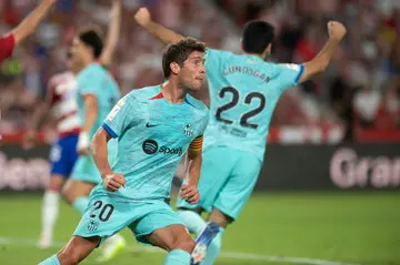 Barcelona came from two down to draw against Granada but are now third and three points behind leaders Real Madrid in La Liga