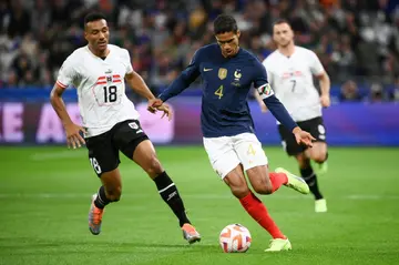 Raphael Varane (R) will be part of the France squad in Qatar despite an injury that has sidelined him at Manchester United