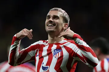 Atletico Madrid's French forward Antoine Griezmann celebrates scoring his team's first goal against Valencia