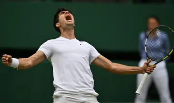 Spain's Carlos Alcaraz celebrates reaching the Wimbledon final