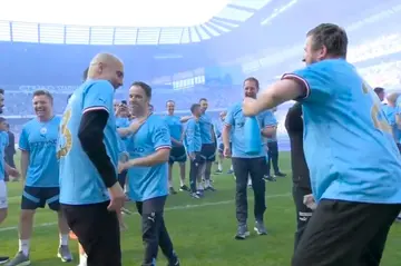 An overjoyed Pep Guardiola joined Manchester City stars, fans, and staff in dance after they were crowned English champions on Sunday