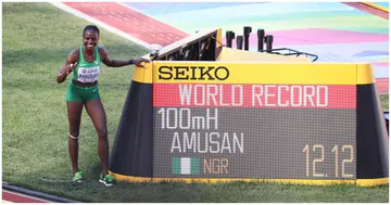 Taiwo Amusan, Michael Johnson, World Athletics Championships