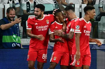 David Neres (C) celebrates after scoring his side's winning goal against Juventus