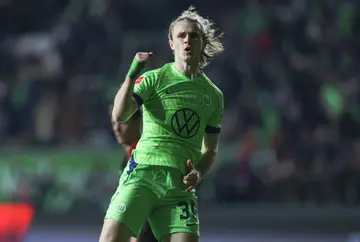 Wolfsburg's  Patrick Wimmer celebrates his late equaliser against Union Berlin