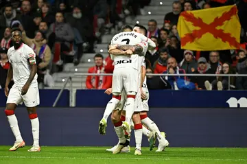 Athletic Bilbao forward Alex Berenguer celebrates scoring the opening goal from the penalty spot against Atletico Madrid on Wednesday