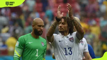 African-American soccer players Jermaine Jones applauds next to Tim Howard after the FIFA World Cup match between the USA and Germany at Arena Pernambuco in Recife, Brazil, June 26 2014. 