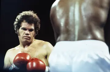 What is Randall Tex Cobb's boxing record?