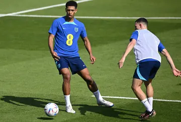 Jude Bellingham (L) is expected to start alongside Declan Rice in England's midfield