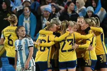 Sweden players celebrate after Rebecka Blomqvist put them ahead against Argentina