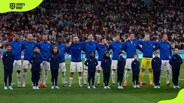 England players sing their national anthem ahead of their FIFA World Cup R16 match against Senegal