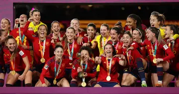 Spain celebrate with the Women's World Cup trophy.