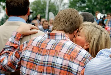 Debbie embraces her son