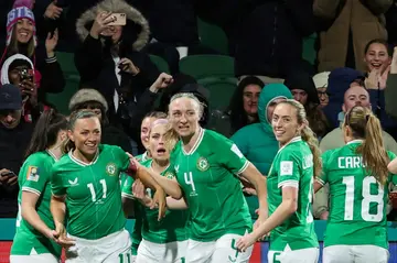 Bittersweet: Ireland captain Katie McCabe (No. 11) celebrates after giving her team the lead, but Canada fought back to eliminate the Irish from the World Cup