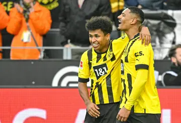 Back on scoresheet: Dortmund's Sebastien Haller (right) celebrates